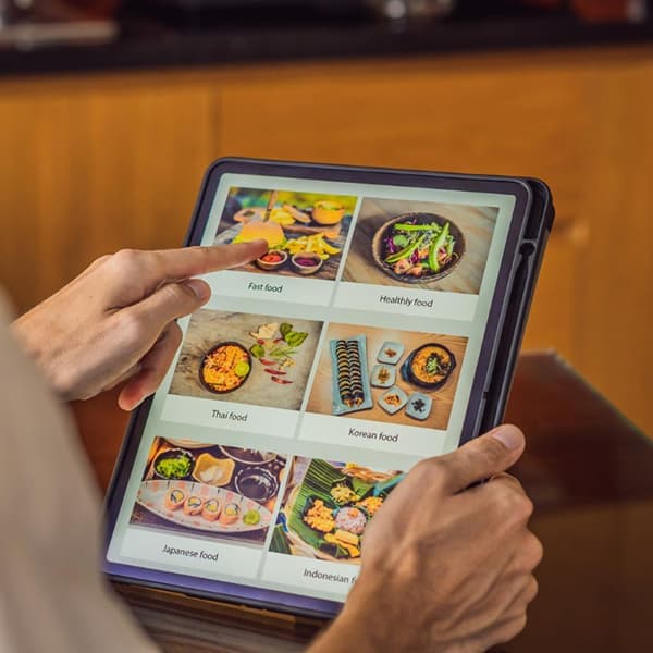 Choosing meals on a tablet