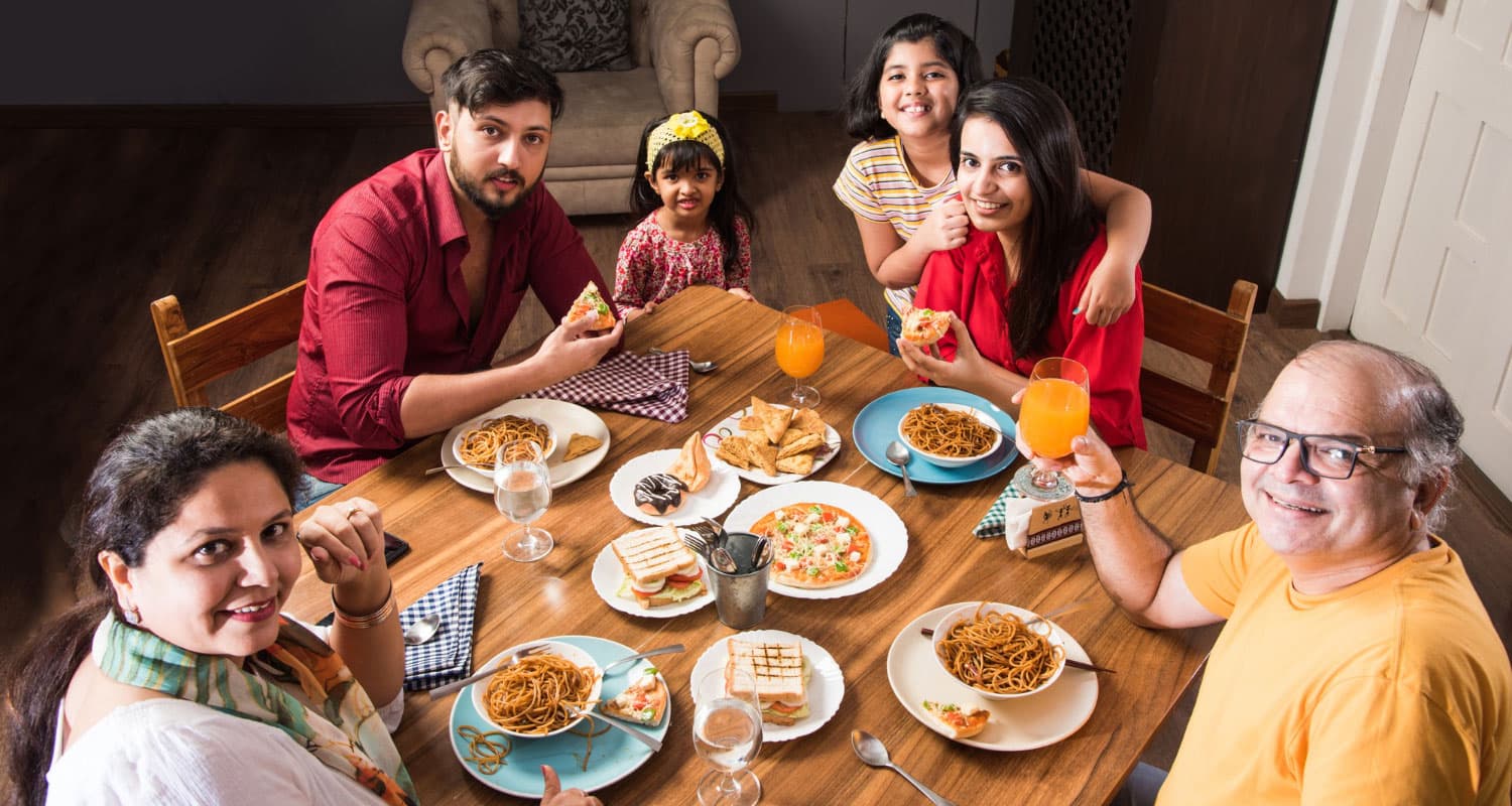 A family sharing a meal around the table